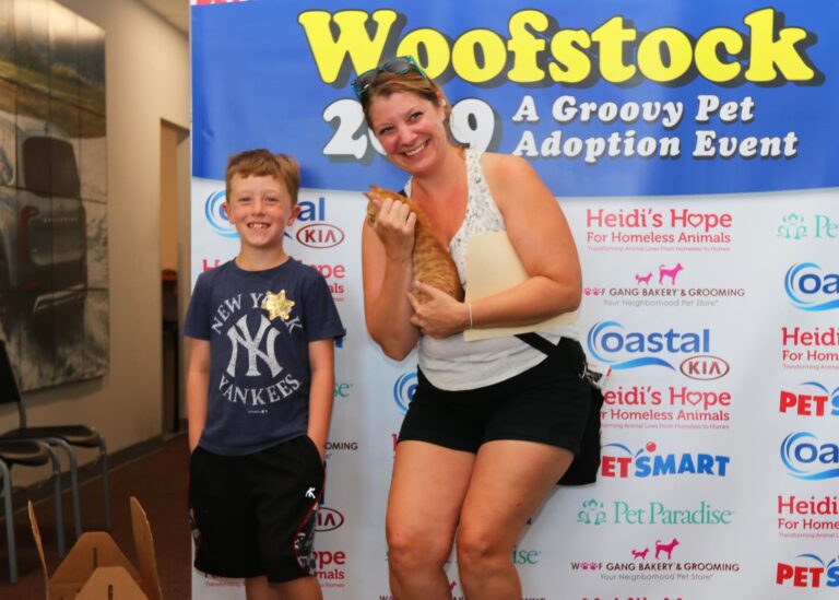 family with new pet woofstock 2019