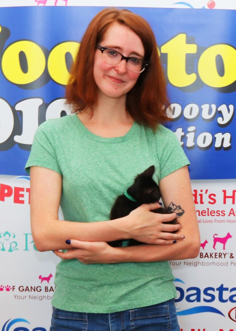 woofstock cat with new owner